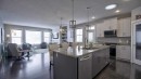 269 Boulder Creek Drive Se, Langdon, AB  - Indoor Photo Showing Kitchen With Double Sink With Upgraded Kitchen 