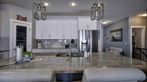 269 Boulder Creek Drive Se, Langdon, AB - Indoor Photo Showing Kitchen With Upgraded Kitchen