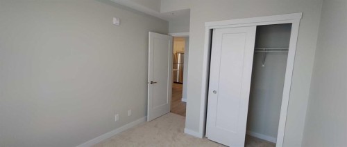 403-660 Shawnee Square Sw, Calgary, AB - Indoor Photo Showing Other Room