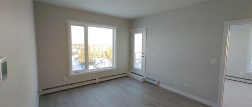 403-660 Shawnee Square Sw, Calgary, AB - Indoor Photo Showing Other Room
