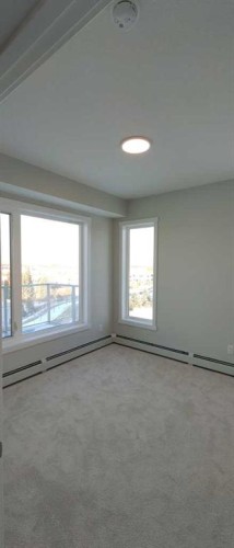 403-660 Shawnee Square Sw, Calgary, AB - Indoor Photo Showing Other Room