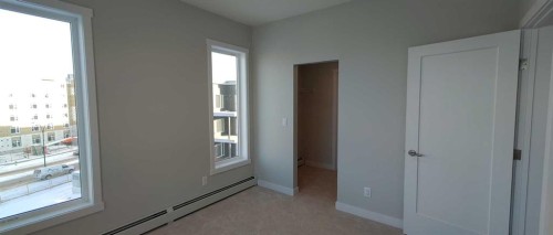 403-660 Shawnee Square Sw, Calgary, AB - Indoor Photo Showing Other Room
