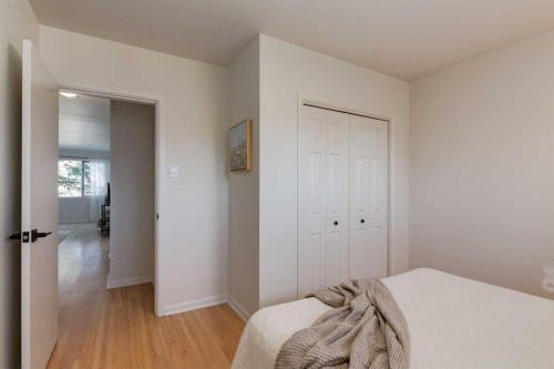 126 Winston Drive Sw, Calgary, AB - Indoor Photo Showing Bedroom