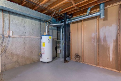 126 Winston Drive Sw, Calgary, AB - Indoor Photo Showing Basement