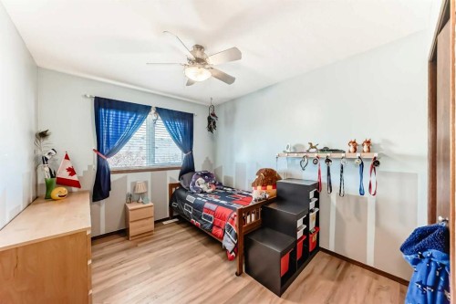 283 Highland Circle, Strathmore, AB - Indoor Photo Showing Bedroom
