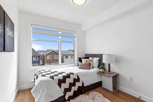 704-200 Belvedere Boulevard Se, Calgary, AB - Indoor Photo Showing Bedroom