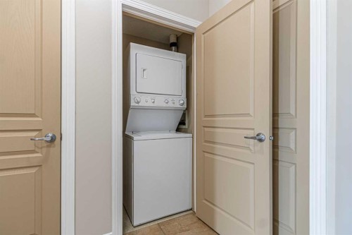 3-148 Rockyledge View Nw, Calgary, AB - Indoor Photo Showing Laundry Room