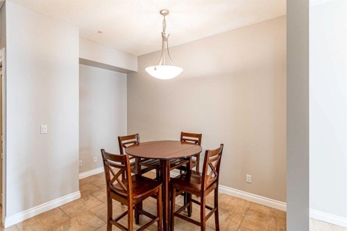3-148 Rockyledge View Nw, Calgary, AB - Indoor Photo Showing Dining Room