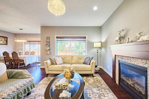 108 Walden Rise Se, Calgary, AB - Indoor Photo Showing Living Room With Fireplace