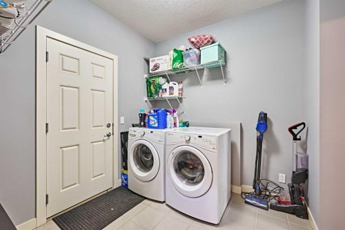 108 Walden Rise Se, Calgary, AB - Indoor Photo Showing Laundry Room