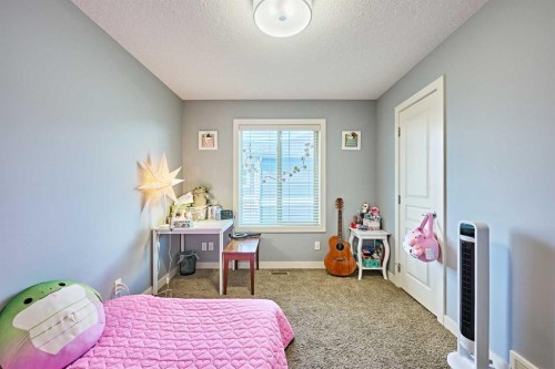 108 Walden Rise Se, Calgary, AB - Indoor Photo Showing Bedroom