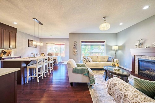 108 Walden Rise Se, Calgary, AB - Indoor Photo Showing Living Room With Fireplace
