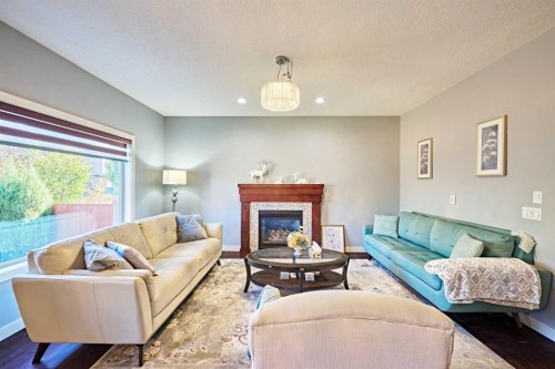 108 Walden Rise Se, Calgary, AB - Indoor Photo Showing Living Room With Fireplace