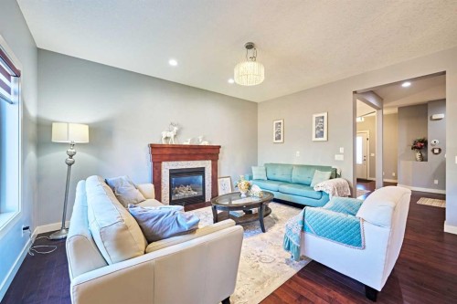 108 Walden Rise Se, Calgary, AB - Indoor Photo Showing Living Room With Fireplace