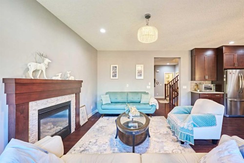 108 Walden Rise Se, Calgary, AB - Indoor Photo Showing Living Room With Fireplace