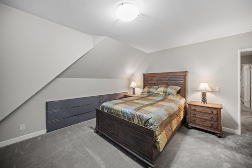 42 Woodhaven Crescent Sw, Calgary, AB - Indoor Photo Showing Bedroom