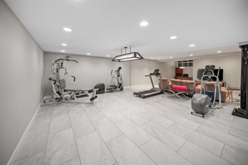 42 Woodhaven Crescent Sw, Calgary, AB - Indoor Photo Showing Gym Room