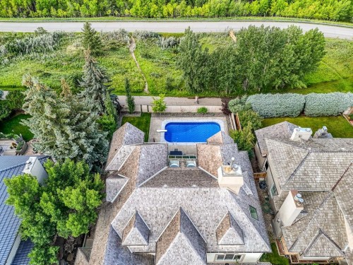 42 Woodhaven Crescent Sw, Calgary, AB - Outdoor With In Ground Pool