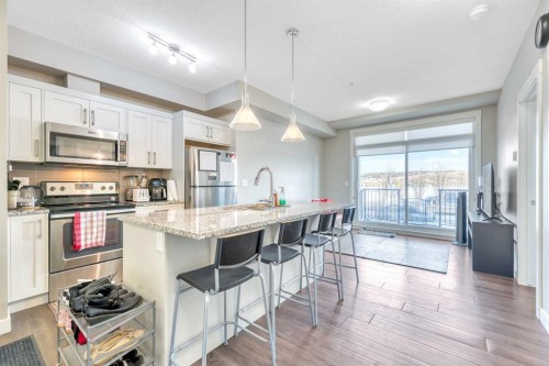 119-10 Walgrove Se, Calgary, AB - Indoor Photo Showing Kitchen With Upgraded Kitchen