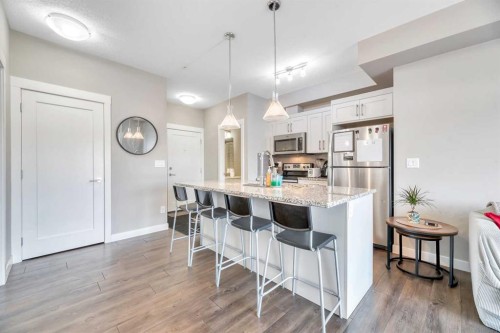 119-10 Walgrove Se, Calgary, AB - Indoor Photo Showing Kitchen With Upgraded Kitchen