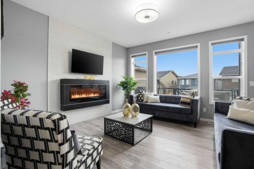 58 Howse Mount Ne, Calgary, AB - Indoor Photo Showing Living Room With Fireplace