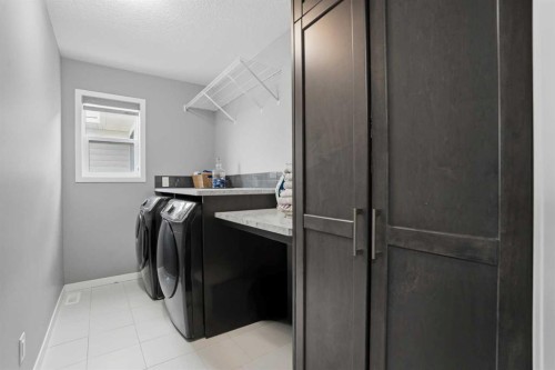 58 Howse Mount Ne, Calgary, AB - Indoor Photo Showing Laundry Room