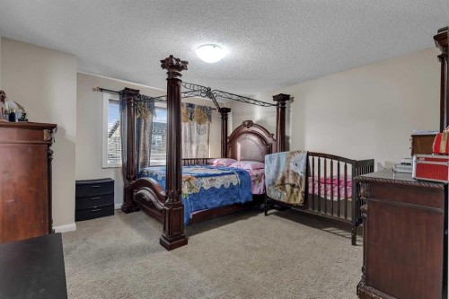 1564 Copperfield Boulevard Se, Calgary, AB - Indoor Photo Showing Bedroom