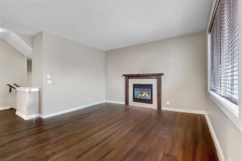 1564 Copperfield Boulevard Se, Calgary, AB - Indoor With Fireplace