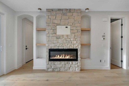 239 22 Avenue Ne, Calgary, AB - Indoor Photo Showing Other Room With Fireplace