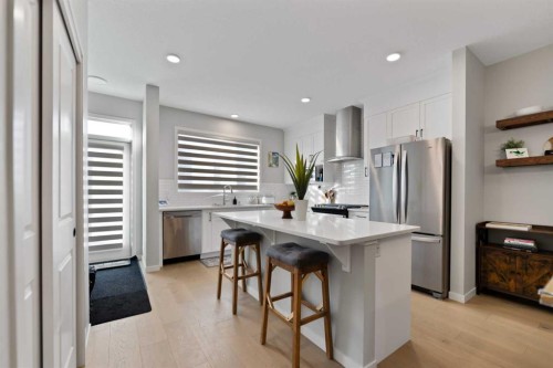 149 Dawson Circle, Chestermere, AB - Indoor Photo Showing Kitchen With Upgraded Kitchen