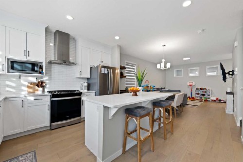 149 Dawson Circle, Chestermere, AB - Indoor Photo Showing Kitchen With Upgraded Kitchen