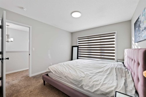 149 Dawson Circle, Chestermere, AB - Indoor Photo Showing Bedroom