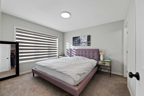 149 Dawson Circle, Chestermere, AB - Indoor Photo Showing Bedroom