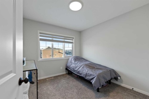 149 Dawson Circle, Chestermere, AB - Indoor Photo Showing Bedroom