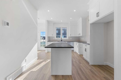 97 Ambleton Boulevard Nw, Calgary, AB - Indoor Photo Showing Kitchen With Double Sink