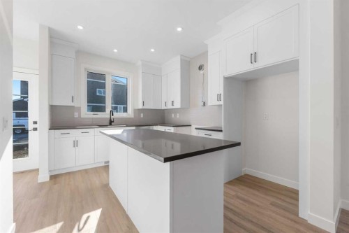 97 Ambleton Boulevard Nw, Calgary, AB - Indoor Photo Showing Kitchen With Upgraded Kitchen
