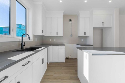 97 Ambleton Boulevard Nw, Calgary, AB - Indoor Photo Showing Kitchen With Double Sink With Upgraded Kitchen