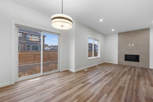 72 Dawson Wharf Mount, Chestermere, AB - Indoor With Fireplace