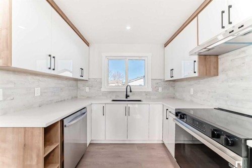 116 Rundlecairn Rise Ne, Calgary, AB - Indoor Photo Showing Kitchen With Upgraded Kitchen