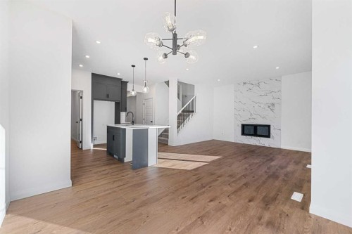 95 Dawson Wharf Mount, Chestermere, AB - Indoor With Fireplace