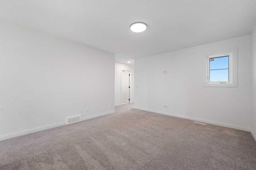 95 Dawson Wharf Mount, Chestermere, AB - Indoor Photo Showing Other Room