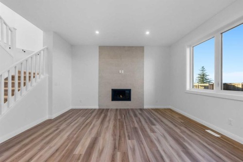 134 Northern Lights Crescent, Langdon, AB - Indoor With Fireplace