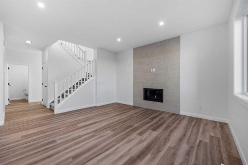 134 Northern Lights Crescent, Langdon, AB - Indoor With Fireplace