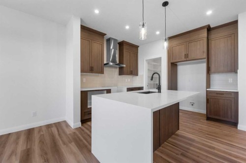 134 Northern Lights Crescent, Langdon, AB - Indoor Photo Showing Kitchen With Upgraded Kitchen