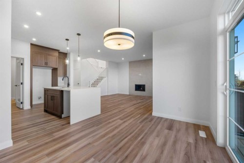 134 Northern Lights Crescent, Langdon, AB - Indoor Photo Showing Kitchen With Upgraded Kitchen