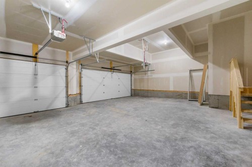 134 Northern Lights Crescent, Langdon, AB - Indoor Photo Showing Garage