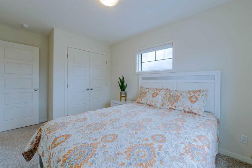 117 Midtown Close Sw, Airdrie, AB - Indoor Photo Showing Bedroom