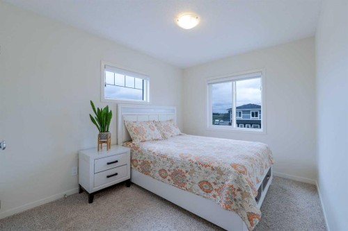 117 Midtown Close Sw, Airdrie, AB - Indoor Photo Showing Bedroom