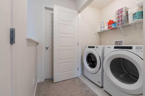 117 Midtown Close Sw, Airdrie, AB - Indoor Photo Showing Laundry Room