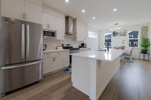 117 Midtown Close Sw, Airdrie, AB - Indoor Photo Showing Kitchen With Stainless Steel Kitchen With Upgraded Kitchen